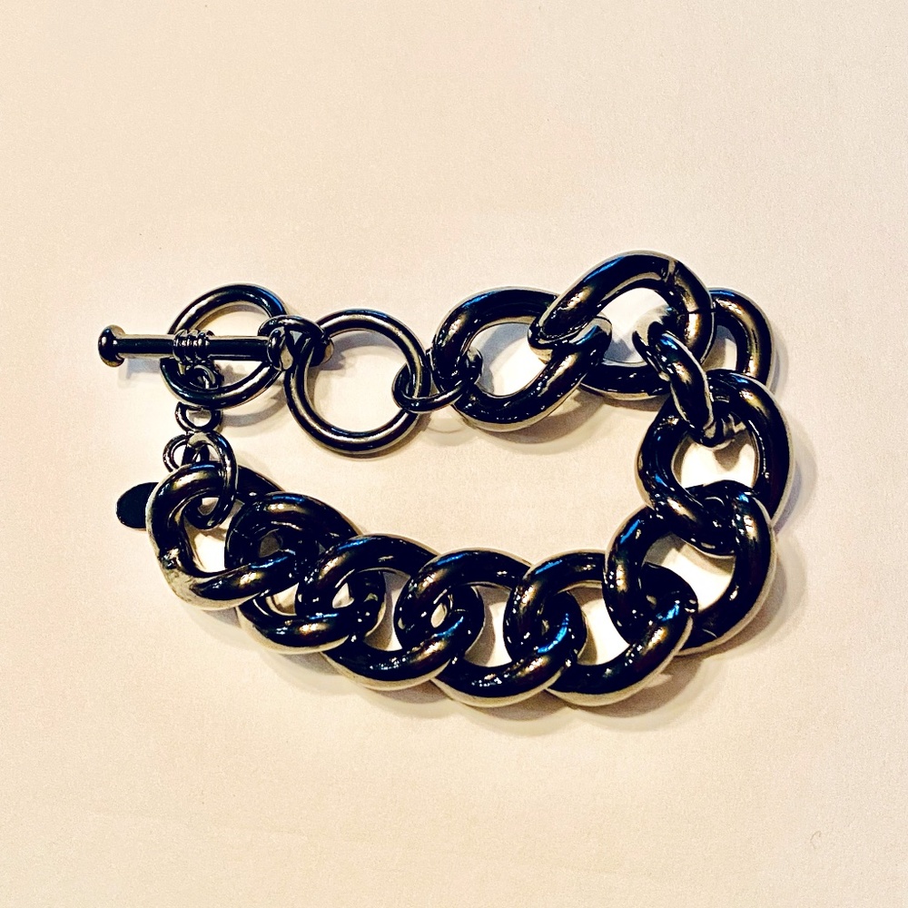 Gorgeous collectible chunky dark tone bracelet by Lia Sophia. Black.
